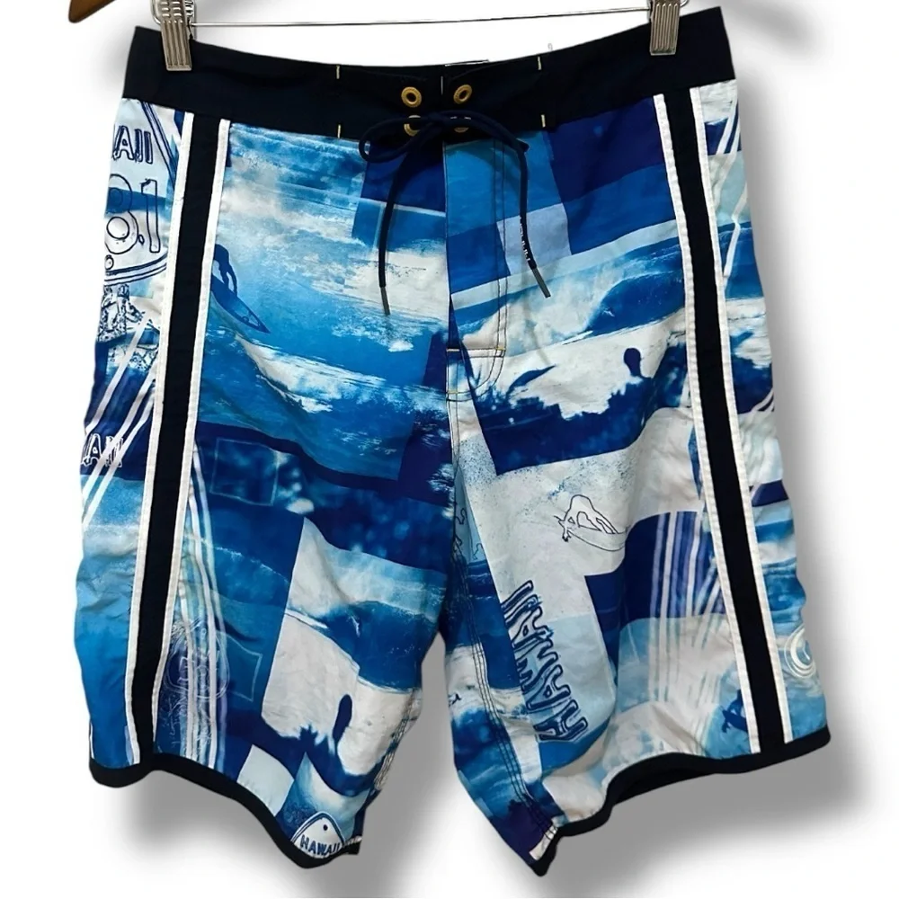 250 Hawaiian 581 | EUC Brazil Men’s Vintage Blue Surf Print Board Shorts (Sz 29)